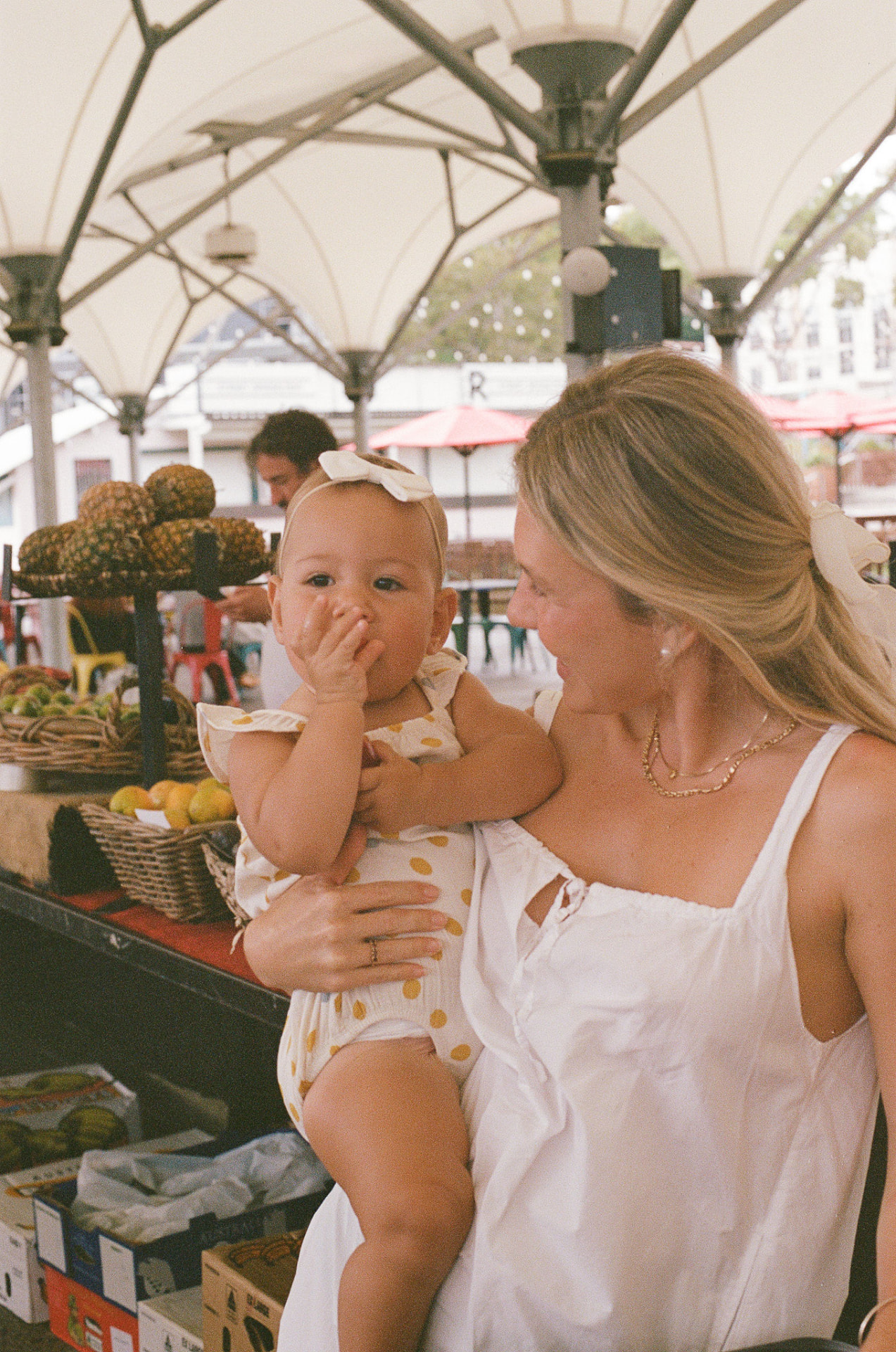 Founder of The Nannying Network holding a mini at the markets